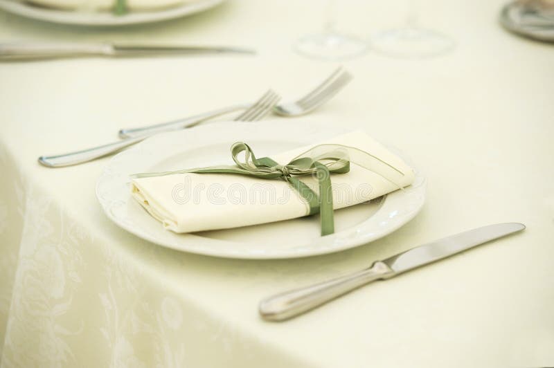 White beautiful table set for a wedding dinner