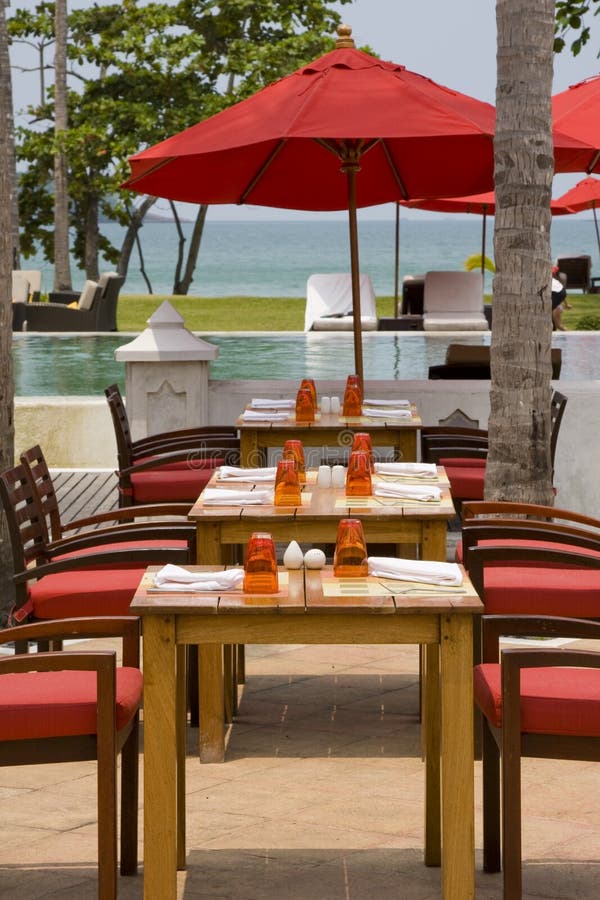 Table and chairs on beach