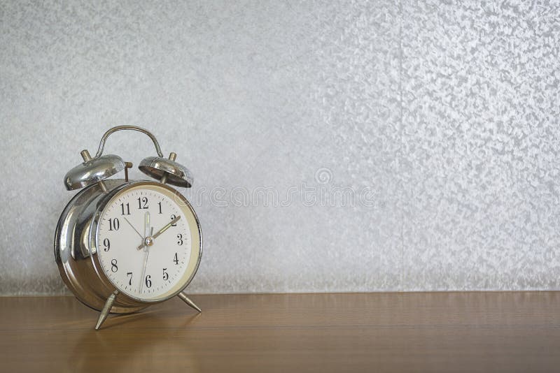 Table clock in the bedroom stock image. Image of antique 95813667