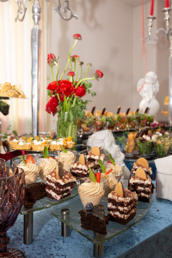 Table with Different Desserts Catering at the Event Stock Photo Image