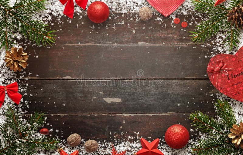 Wooden table with christmas decorations. Top view of board with free space for greeting text. Wooden table with christmas decorations. Top view of board with free space for greeting text.