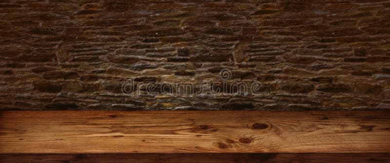 Table En Bois Rustique Avec Le Mur En Pierre Image Stock