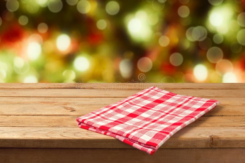 Christmas background empty wooden table with tablecloth ready for product montage display. Christmas background empty wooden table with tablecloth ready for product montage display