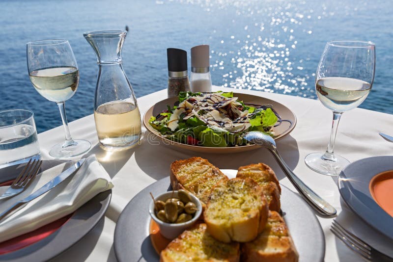Table with food and wine stock images Table with food and wine stock images
