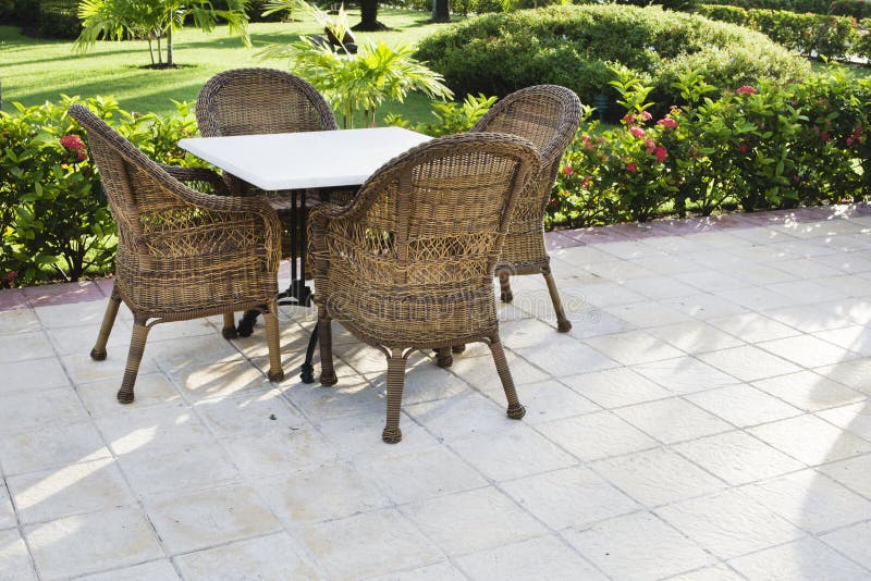Table and four chairs on patio royalty free stock image