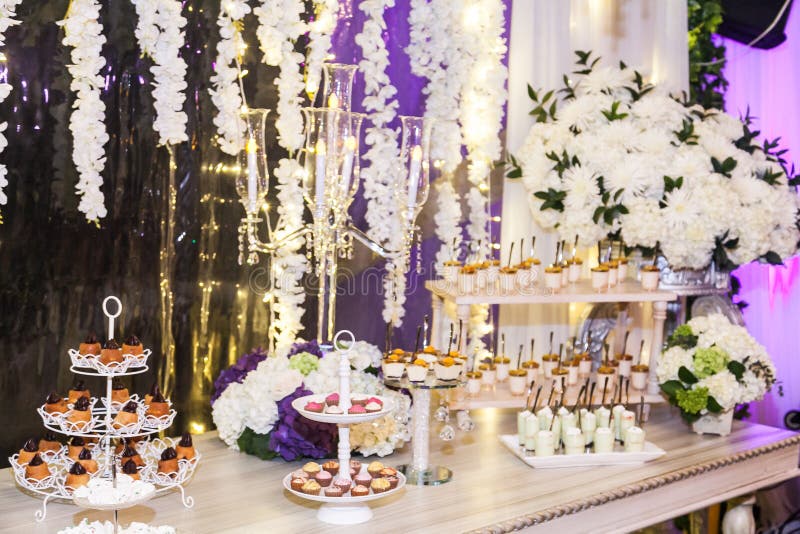 Delicious wedding reception candy bar dessert table stock photography