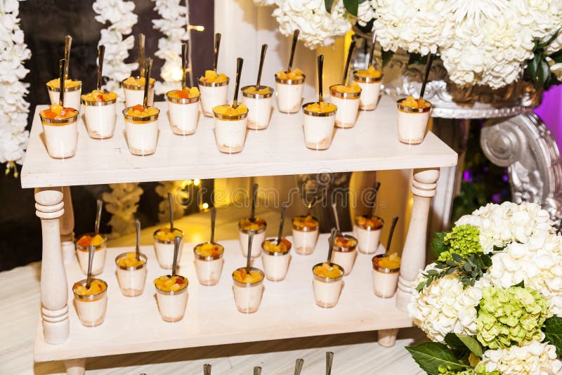 Delicious wedding reception candy bar dessert table royalty free stock photo