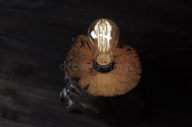 Table Lamp. Edison. Light from the Lamp. on the Table. Stock Photo