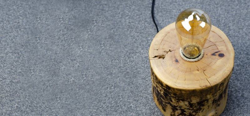 Table lamp. Lamp in loft style. On the table. Edison lamp royalty free stock images