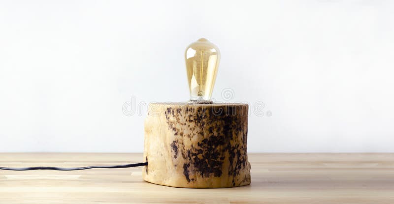 Table lamp. Lamp in loft style. On the table. Edison lamp stock photography