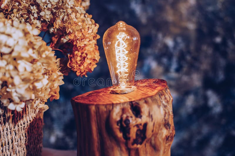 Table lamp made of wood. Edison electric lamp. Incandescent lamp. royalty free stock images