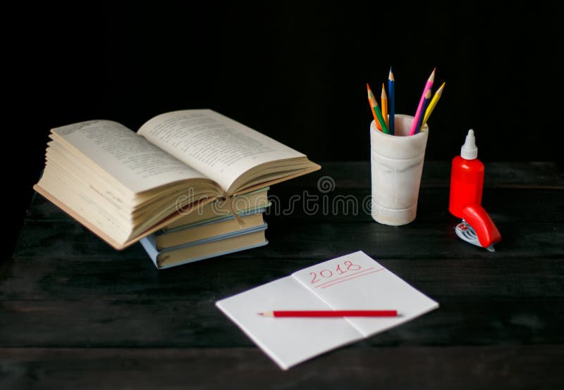 On the table lay a book,Notepad with pen royalty free stock photos