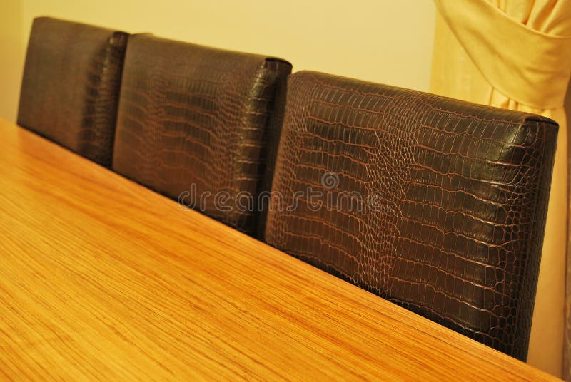 Table and leather chairs stock photo. Image of fracture 29075240