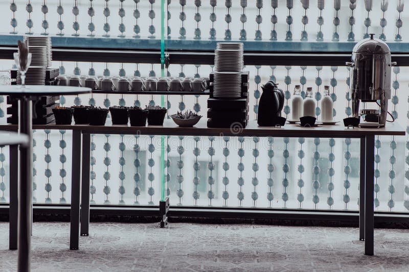 A Table in a Modern Hotel with Dishes Ready To Serve Guests Stock Image