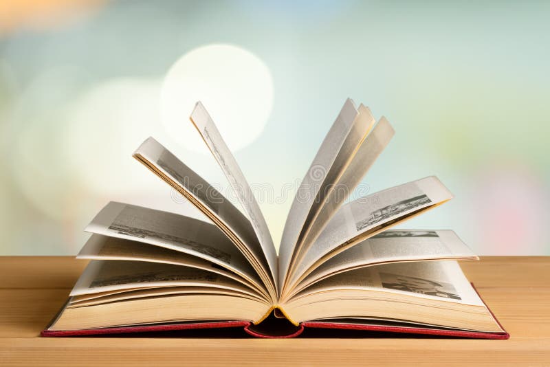 Open book on table,close up stock photography