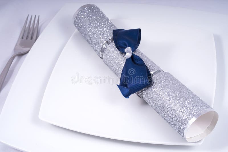 Table Place Setting with a Traditional Cracker stock image