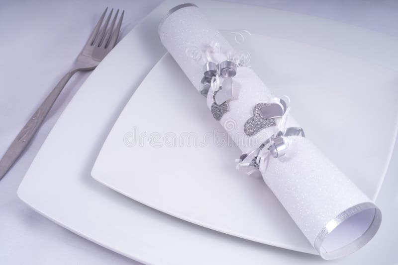 Table Place Setting with a Traditional Cracker royalty free stock photo