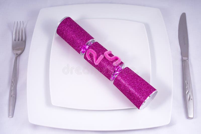 Table Place Setting with a Traditional Cracker for a 25th stock photo
