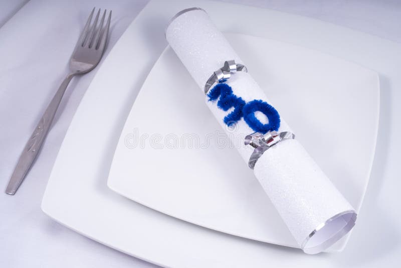 Table Place Setting with a Traditional Cracker for a 30th royalty free stock image