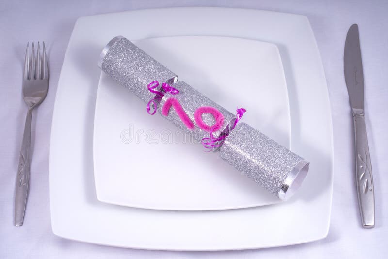 Table Place Setting with a Traditional Cracker for a 70th stock images