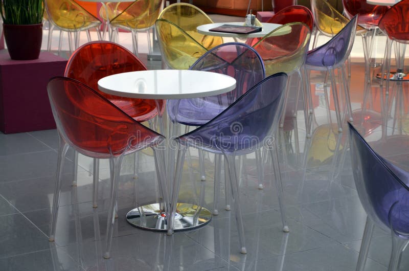 Table and plastic chairs stock image. Image of table 24984183