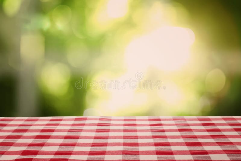 Table with Red Checkered Cloth Indoors. Space for Design Stock Photo