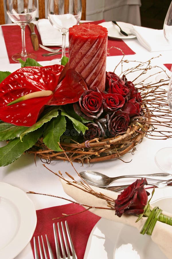 Table with Red roses and candle