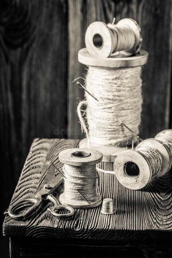 Table with Scissors, Needle and Threads in Tailor Workshop Stock Photo ...