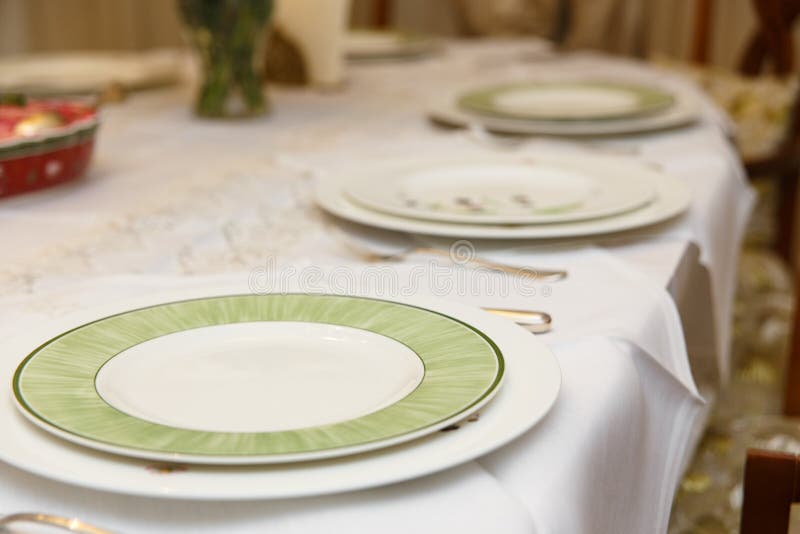 Table Setting with Dishes and Tableware in Stylish Home Interior Stock