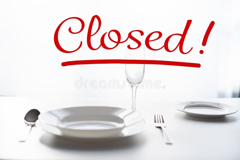 Table Setting in a Restaurant. the Word Closed As a Concept for