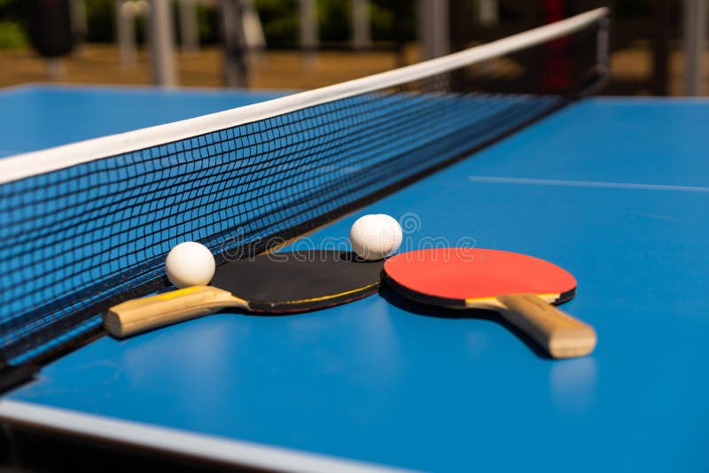 Table Tennis Ball and Bat. stock image. Image of center 255228285