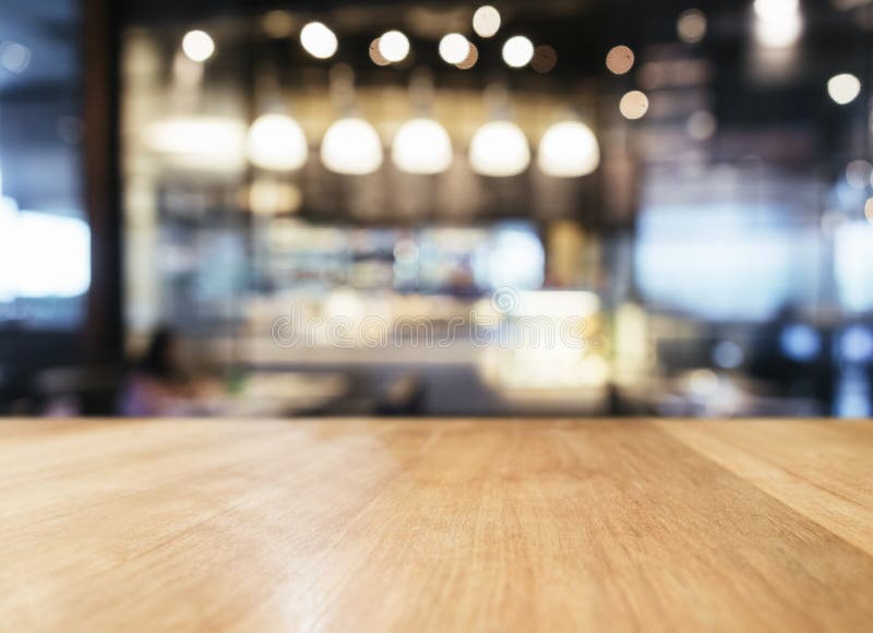 Table top with Blurred Bar restaurant cafe interior background