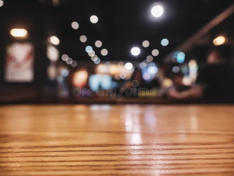 Table top wooden counter Bar restaurant interior lighting blur background nightlife. Table top wooden counter Bar restaurant interior lighting blur background nightlife