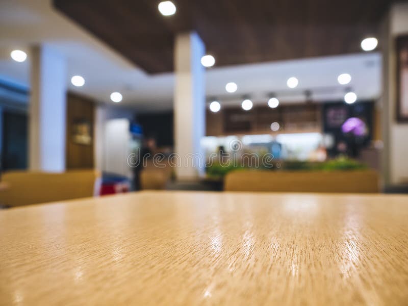 Table top Wooden counter Cafe Restaurant interior lighting Blur background