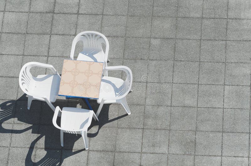 Table with Plastic Chairs stock image. Image of idea 108069227