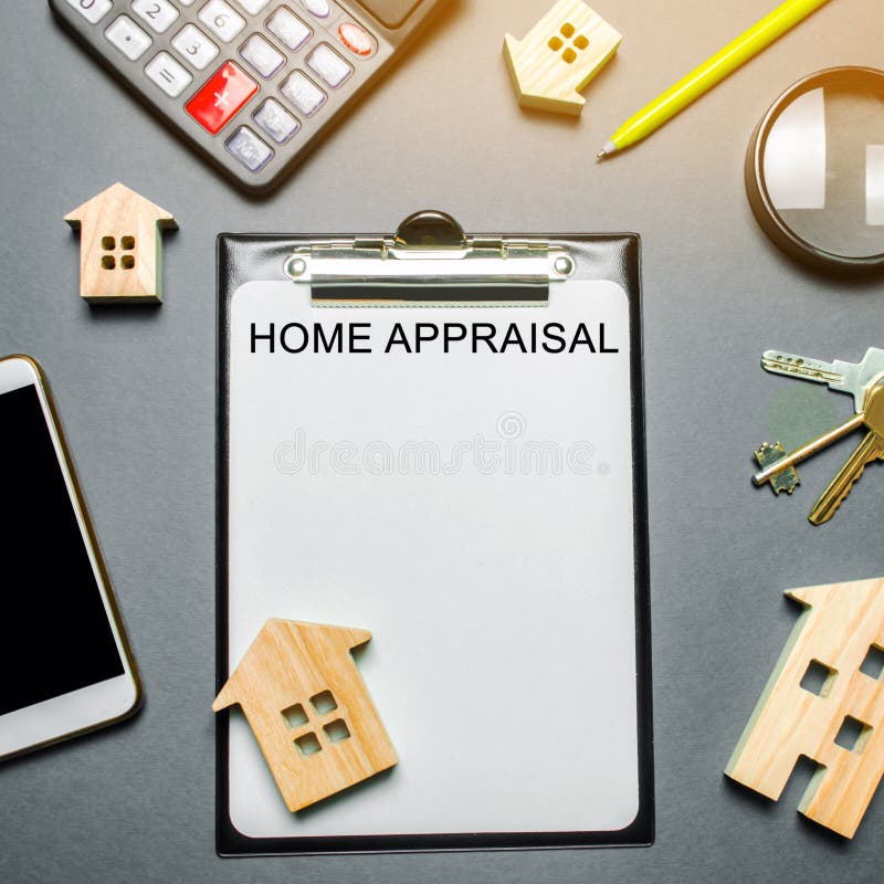 Table with wooden houses, calculator, coins, magnifying glass with the word Home appraisal. The contract for real estate appraisal