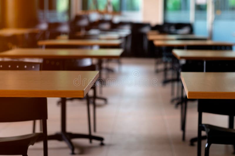 Tables and Chairs that is Arranged Spaced or Social Distancing in the