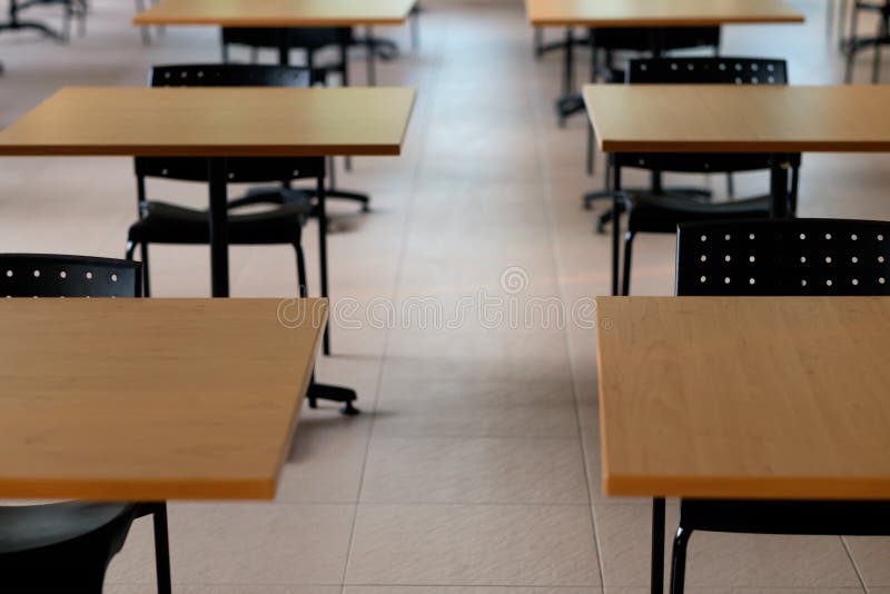 Tables and Chairs that is Arranged Spaced or Social Distancing in the