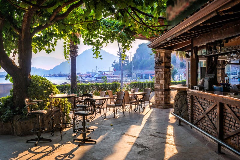 Tables and Chairs in a Hotel Bar, Marmaris, Turkey Stock Photo Image