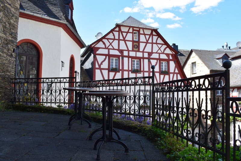Tables on a small terrace on second floor level stock photos