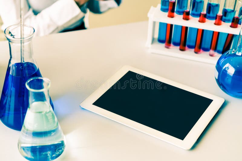 Tablet Computer in Chemistry Laboratory. Stock Photo Image of