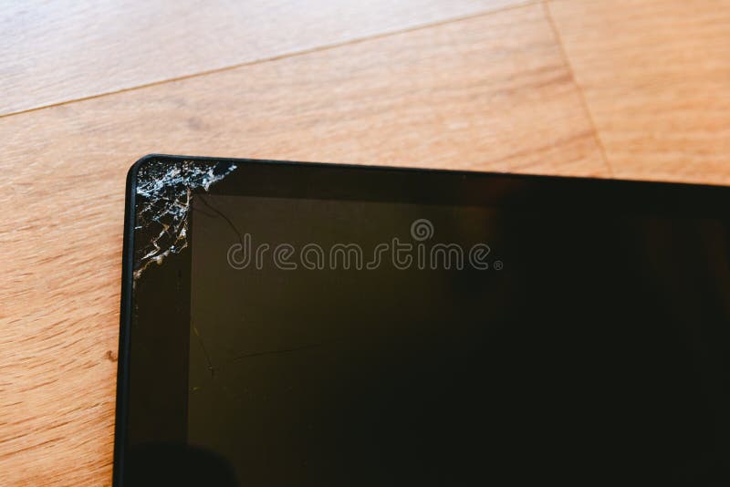 Tablet Computer Screen with Broken Glass after a Fall Stock Image