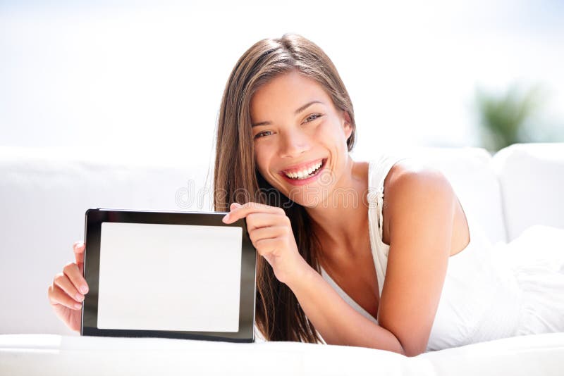 Tablet computer. Woman showing blank screen happy royalty free stock photos