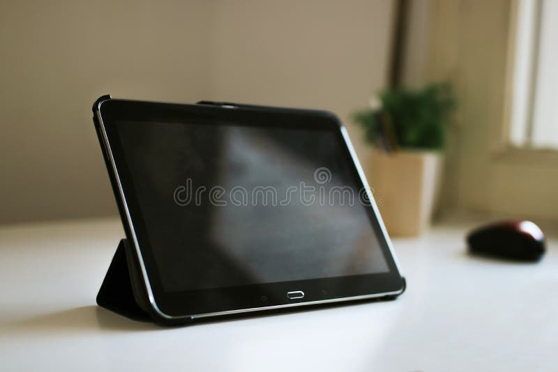 The tablet or ebook stock image. Image of desk, tablet 97244077