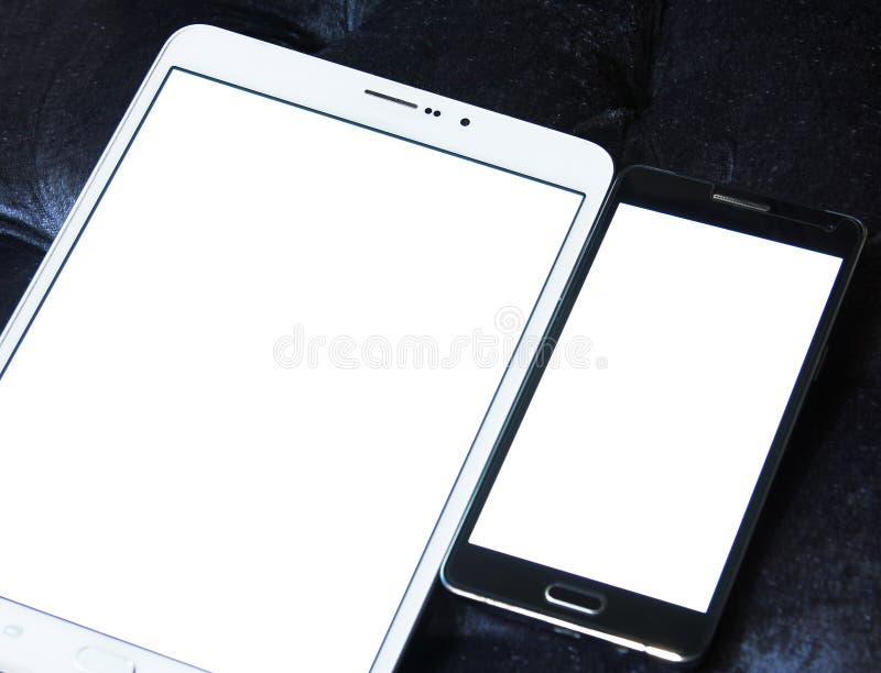 Tablet en mobiel met exemplaarruimte op het witte scherm stock fotografie Tablet en mobiel met exemplaarruimte op het witte scherm stock fotografie