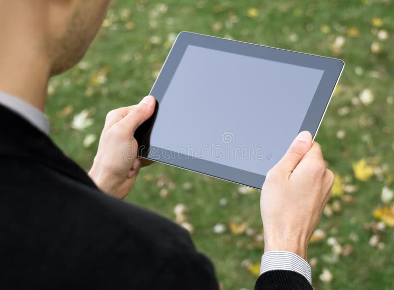 tablet för affärsmanholdingPC arkivfoton tablet för affärsmanholdingPC arkivfoton