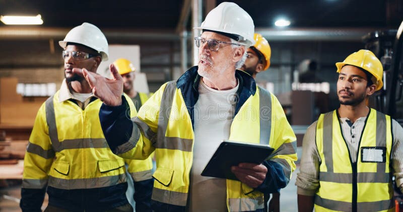 Tablet, people or manager in carpentry warehouse for furniture manufacturing, renovation or labor. Mentor, apprentice or stock photography