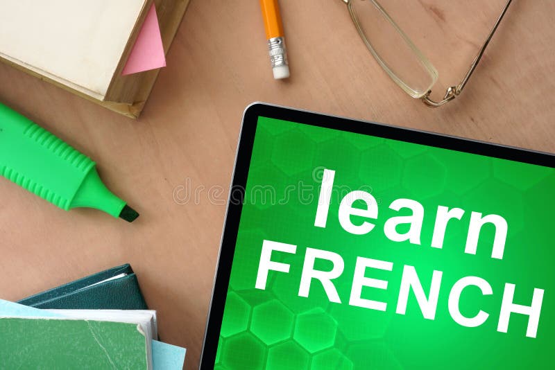 Tablet with Words Learn French Stock Photo Image of site, books 54479508