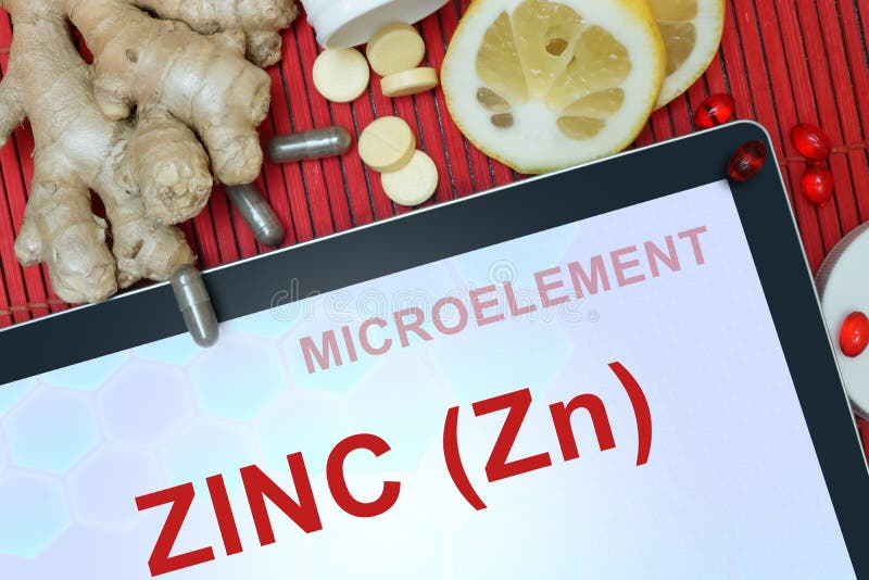 Tablet with words Zinc (Zn).