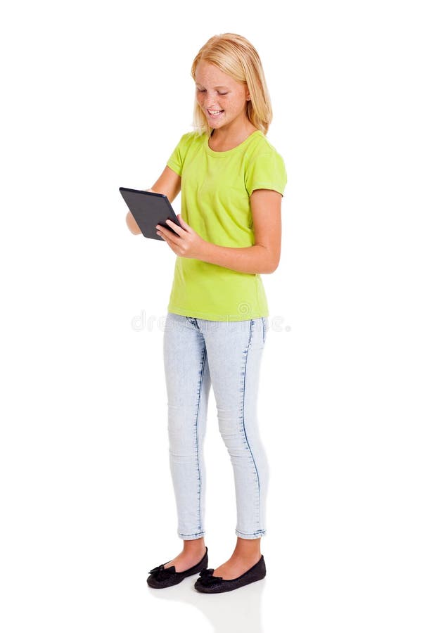 Tableta de la muchacha del preadolescente imagen de archivo libre de regalías
